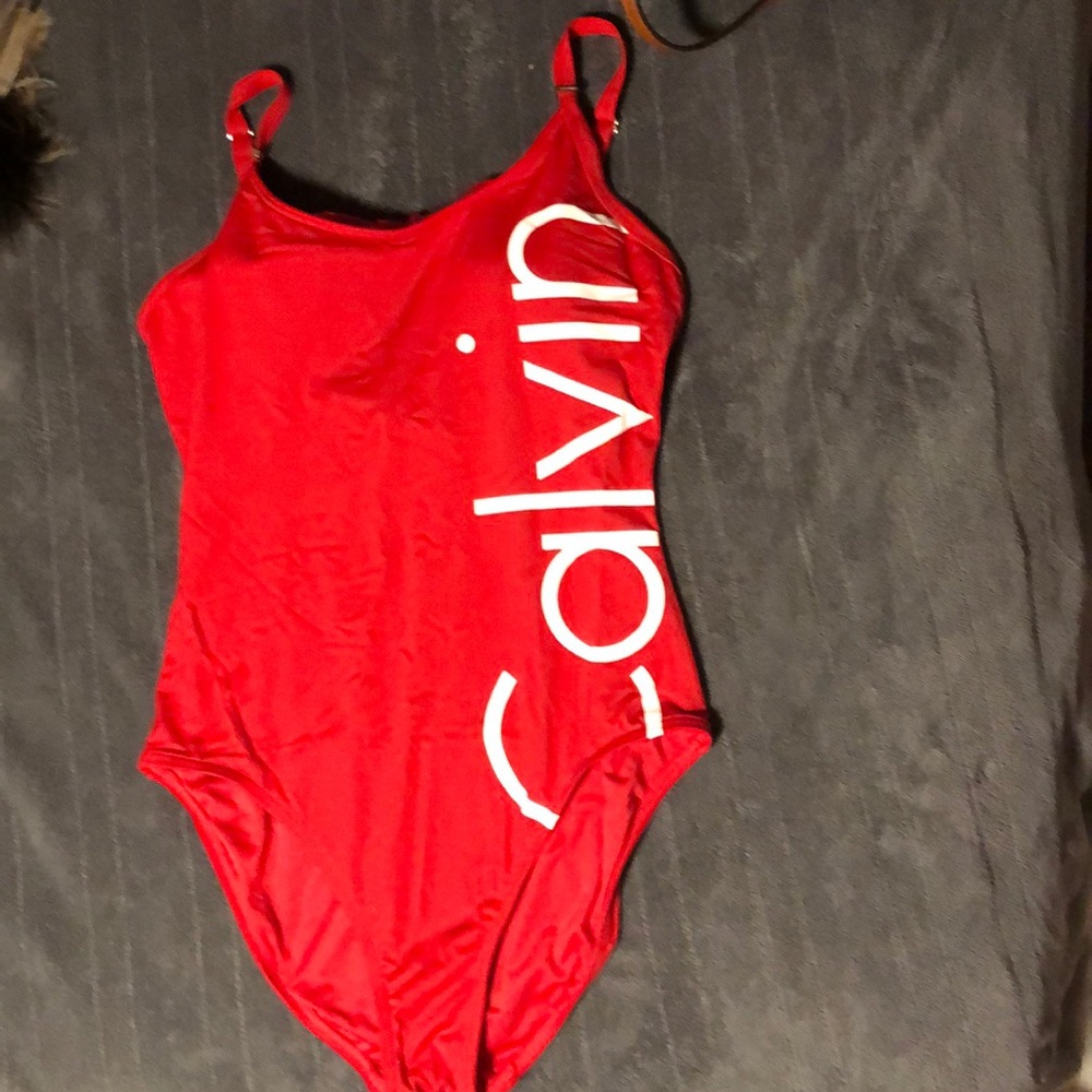 Red Calvin Klein one piece swim suit